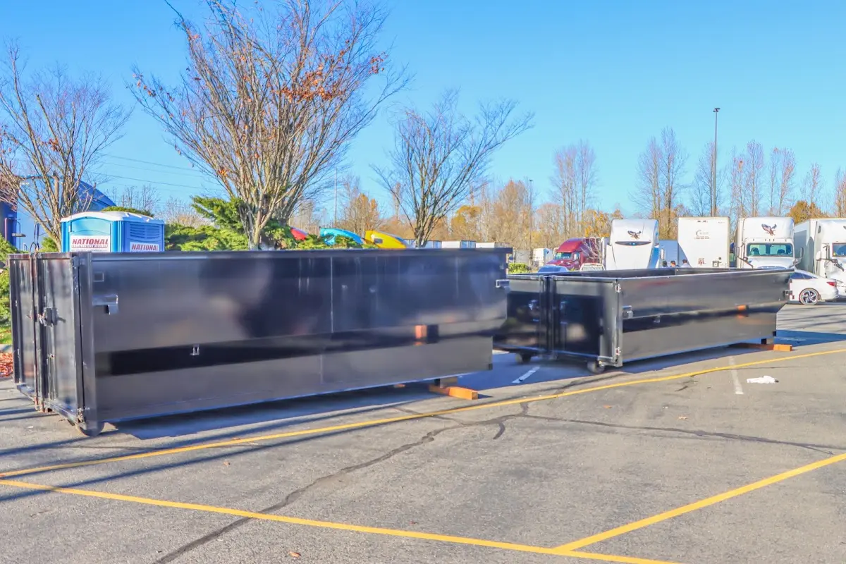 Professional dumpster rental service with roll-off container on residential driveway in Copperas Cove